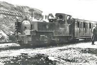 b/w photo of Russell & train at Bedgelert