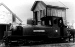 steam locomotive; crew posing; signalbox behind