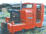 small red diesel locomotive