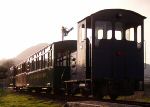 diesel locomotive with train; b/w