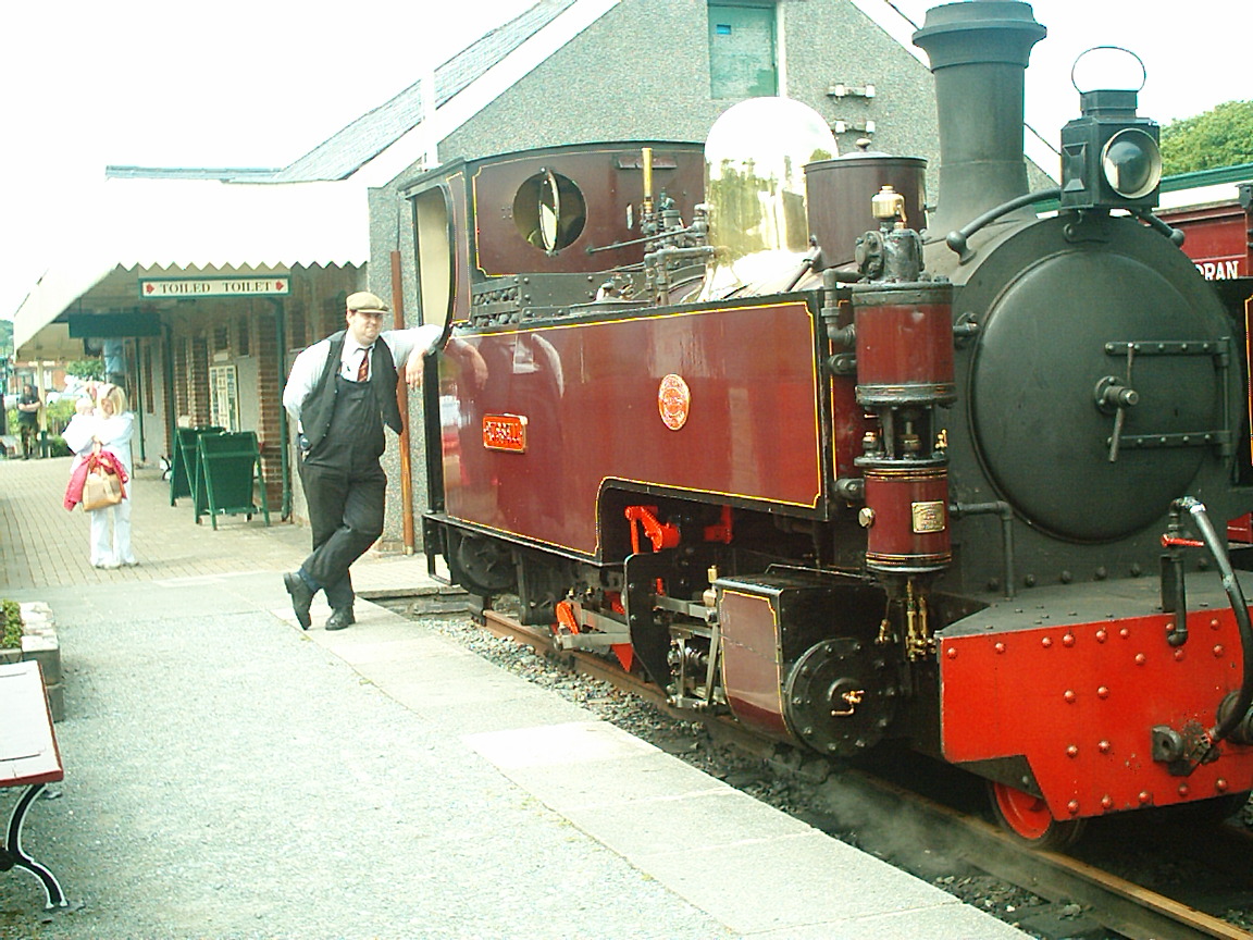 Russell sits in the headshunt at Porthmadog station. The large brass dome is a source of strong emotions among steam crews. If you