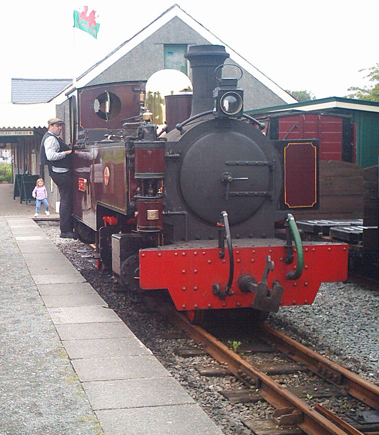 Work nearly done for the day, Russell prepares to run round the train before heading back to the sheds for the night.  We hope to restore Russell to this condition, as well as doing work to bring it even closer to original 1906 condition. But we need your help...... donations.  [Thomas McNeilly]