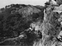 train in steep rock cutting