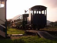 diesel locomotive with train; b/w