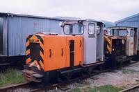 small diesel; orange body and grey cab; black/orange chevrons on front