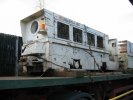 two locomotives on the back of a lorry